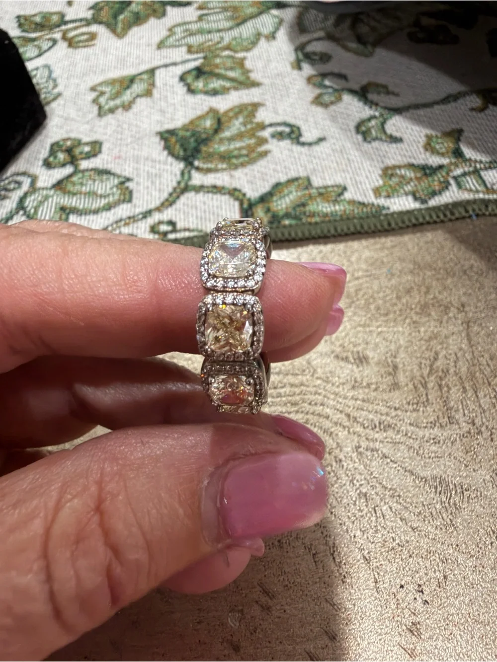 Elegant Yellow-Gold Halo Ring with Clear Accent Stones